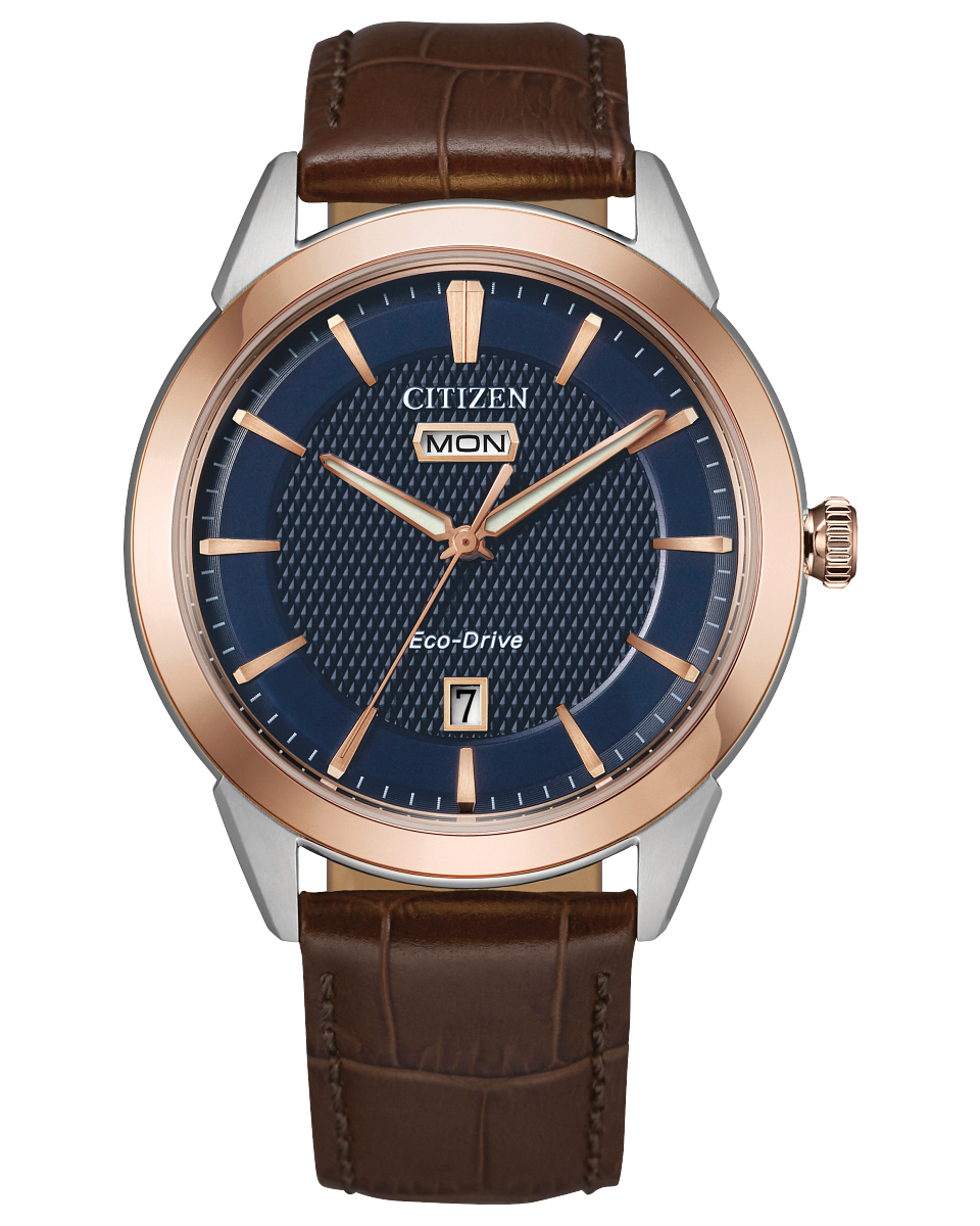Citizen watch with rose gold and navy dial date tracker and leather band model AW0096-06L