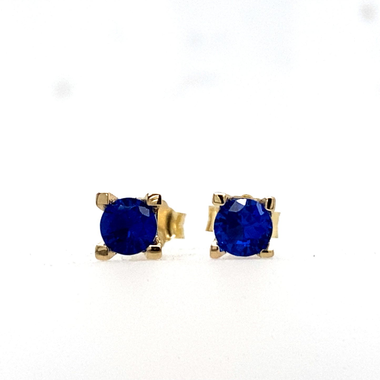 Sapphire Color CZ and gold earrings